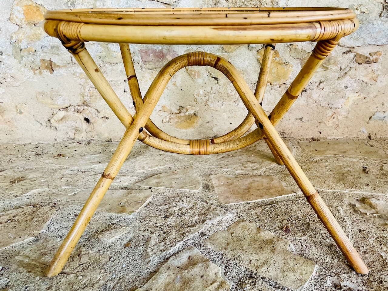 Round bamboo and rattan coffee table with glass top, circa 1960s