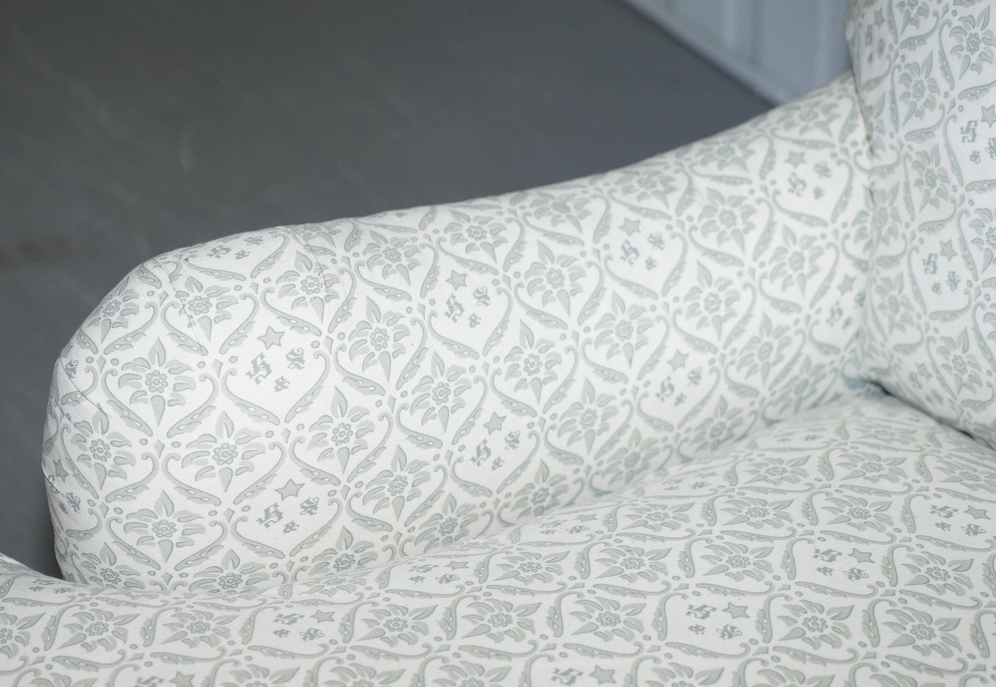 Howard & Sons canapé with feather cushions and ticking fabric, Victorian style.