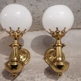 Pair of brass boat swivel appliques - opalin glass globe