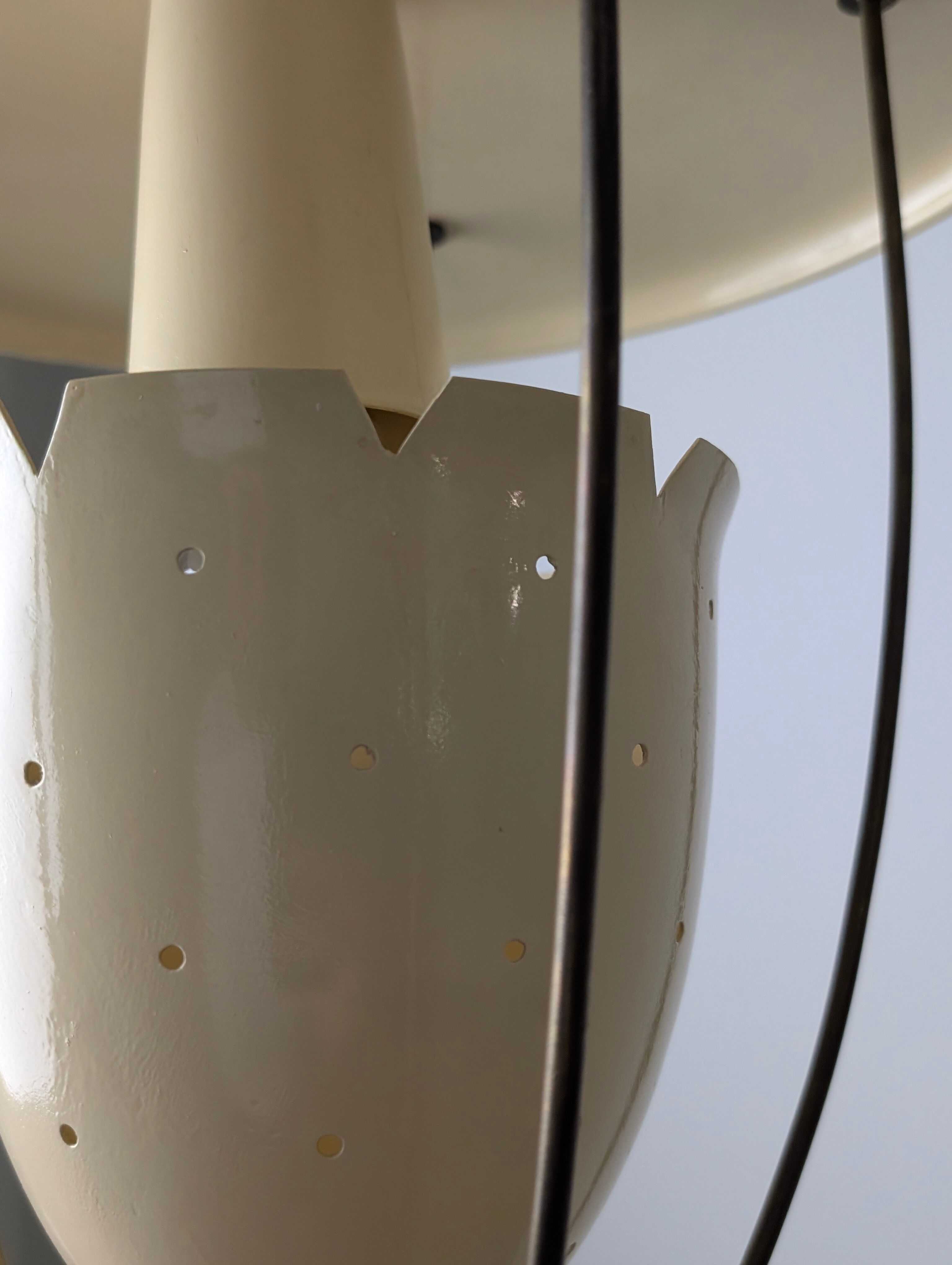 Perforated metal pendant lamp with brass details, Italy, 1940s