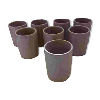 8 signed enamelled ceramic mugs