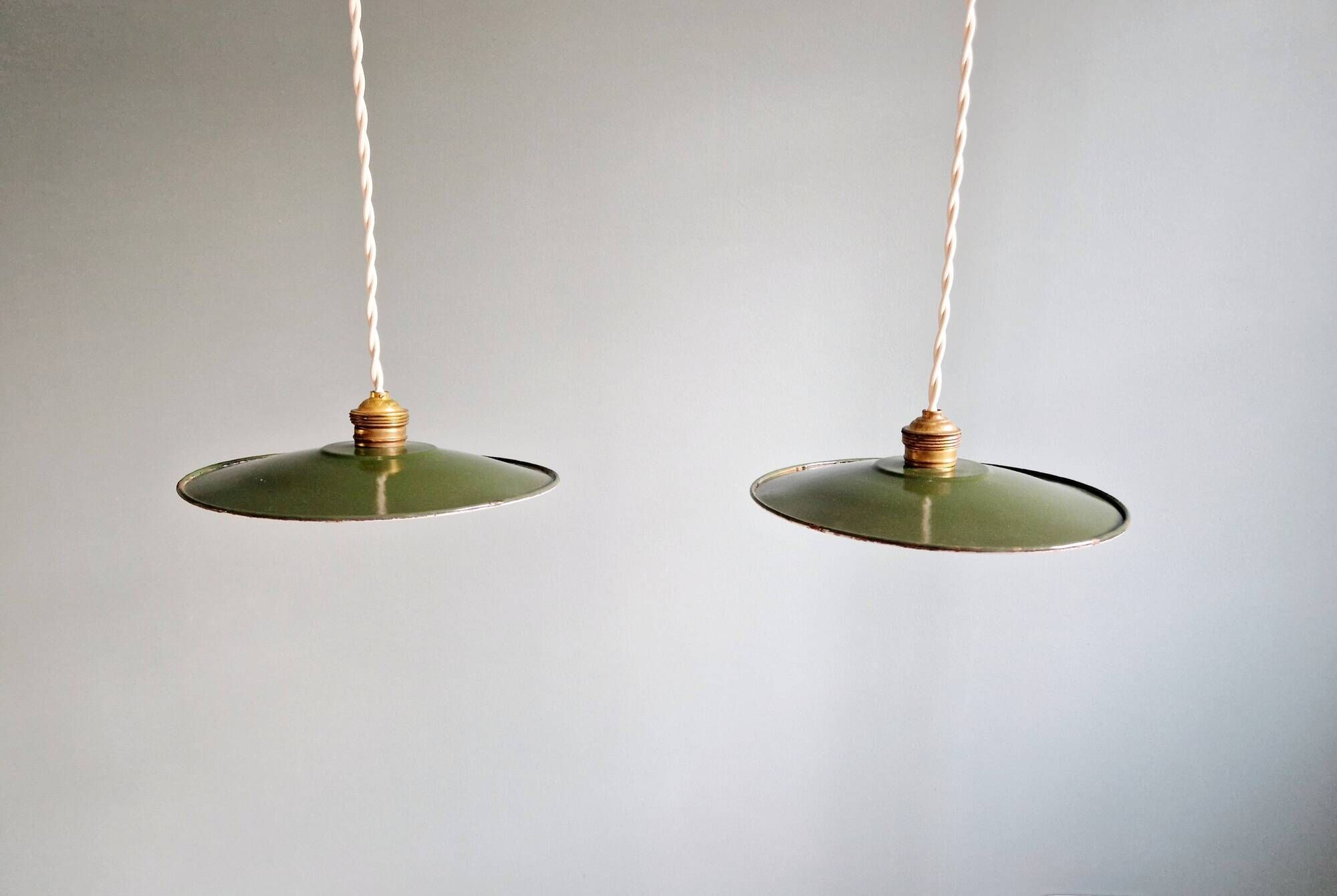 Pair of industrial pendant lights in green enamelled sheet metal
