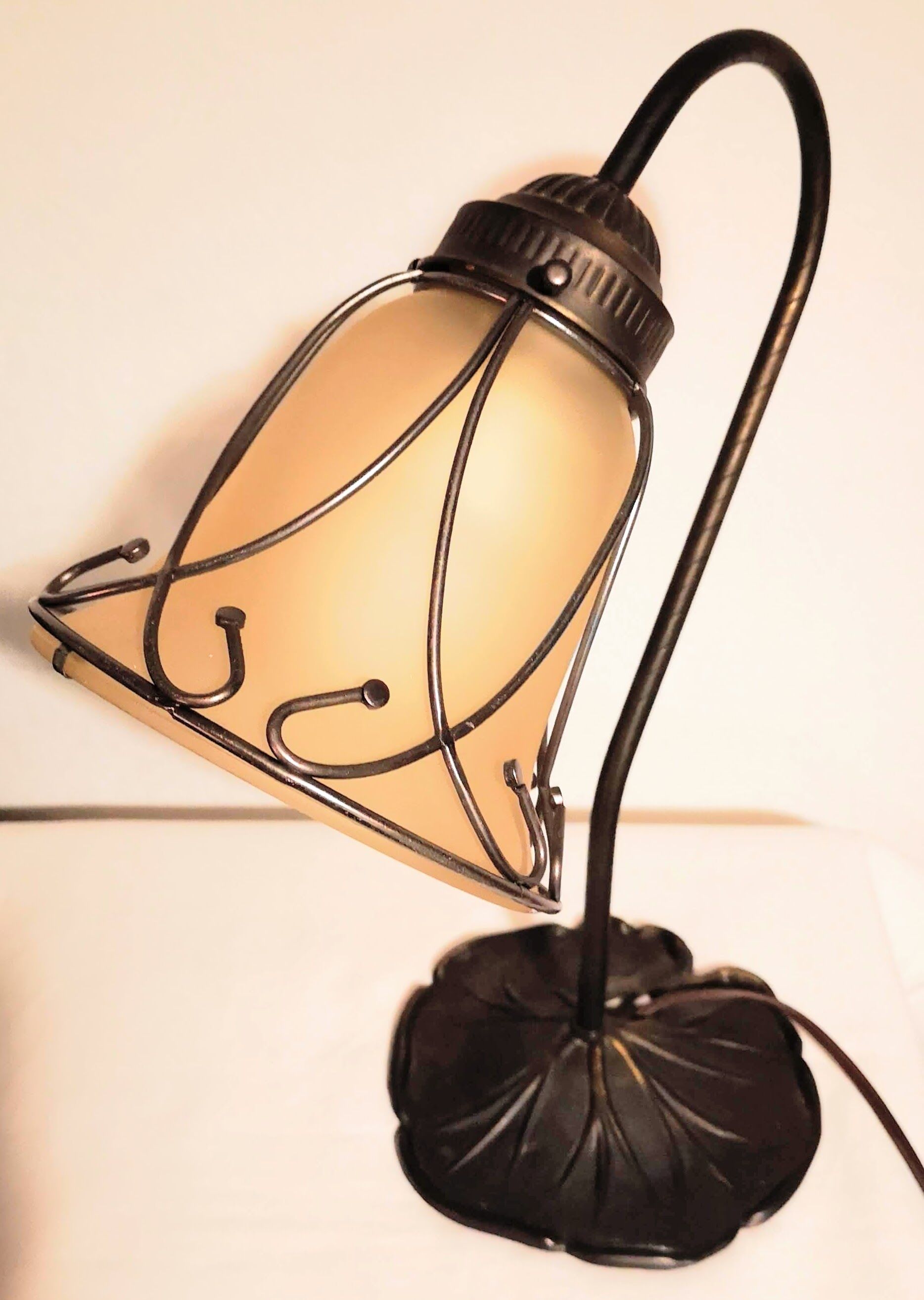 Aged metal and tulip glass