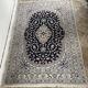 Hand-knotted Nain Persian rug with blue and white floral design