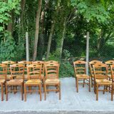 12 solid wood and straw chairs