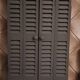 Dark grey wooden trompe l'oeil shutter mirror 1990 / wall decoration object Shutter-style mirror