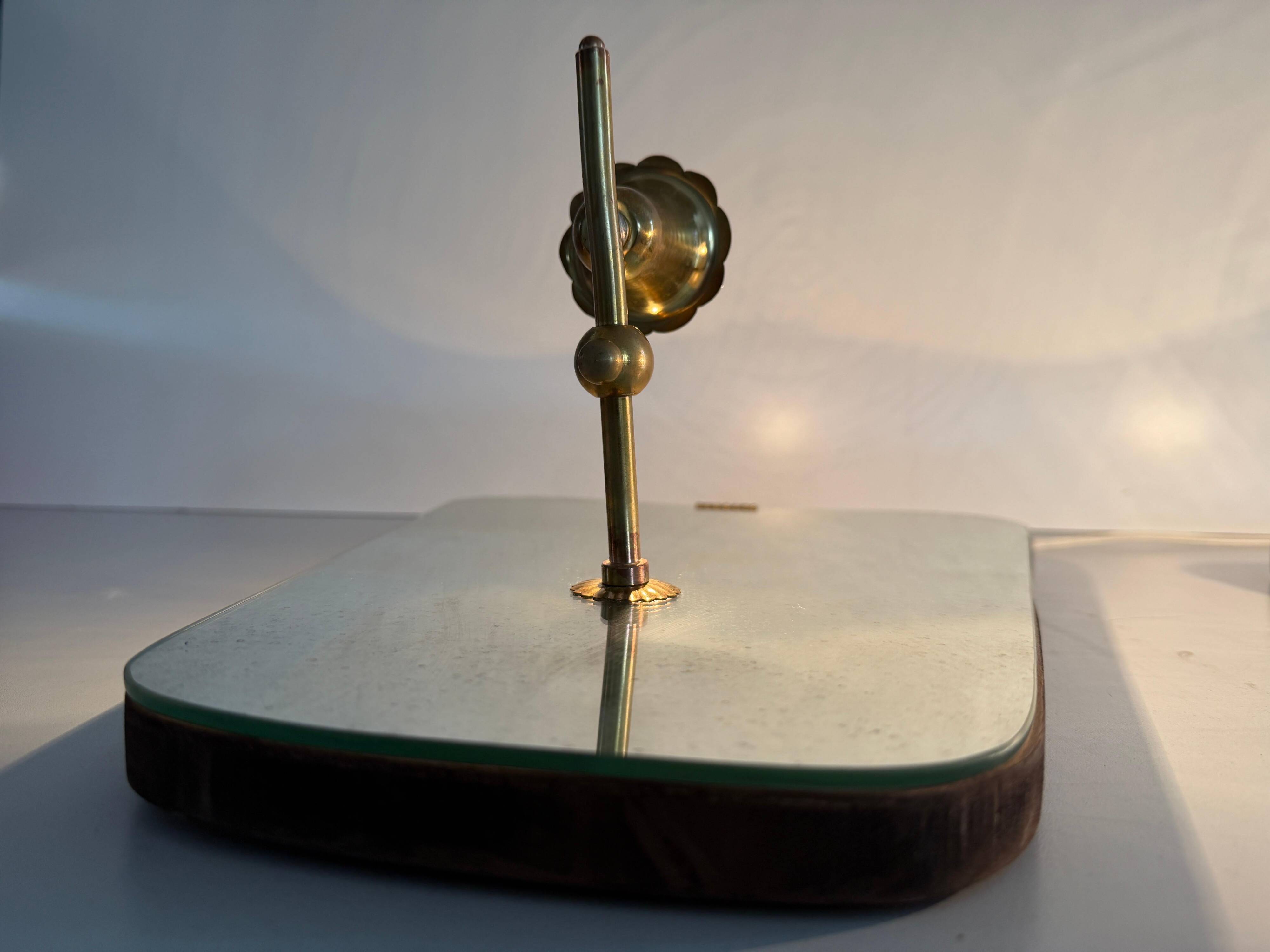 Pair of brass wall lights with mirrors, mid-20th century, Italy, 1960.