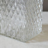 Transparent vintage decanter in chiseled glass and its hermetic cap 70's years