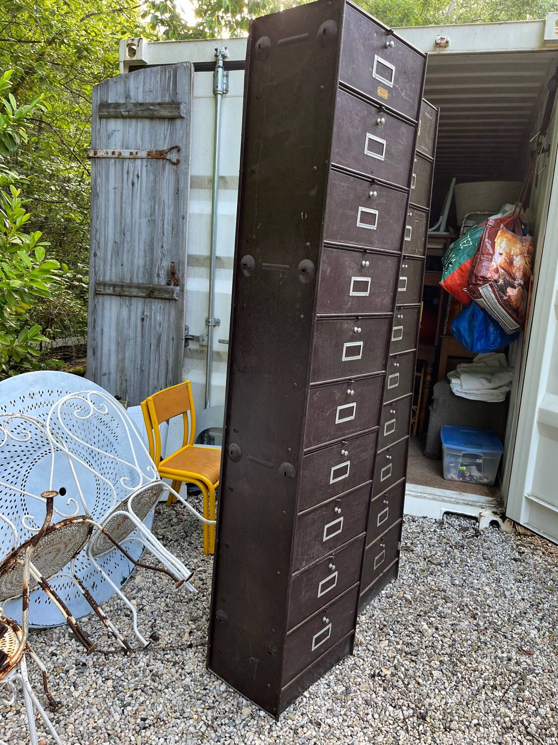 Duo of metal lockers with flaps