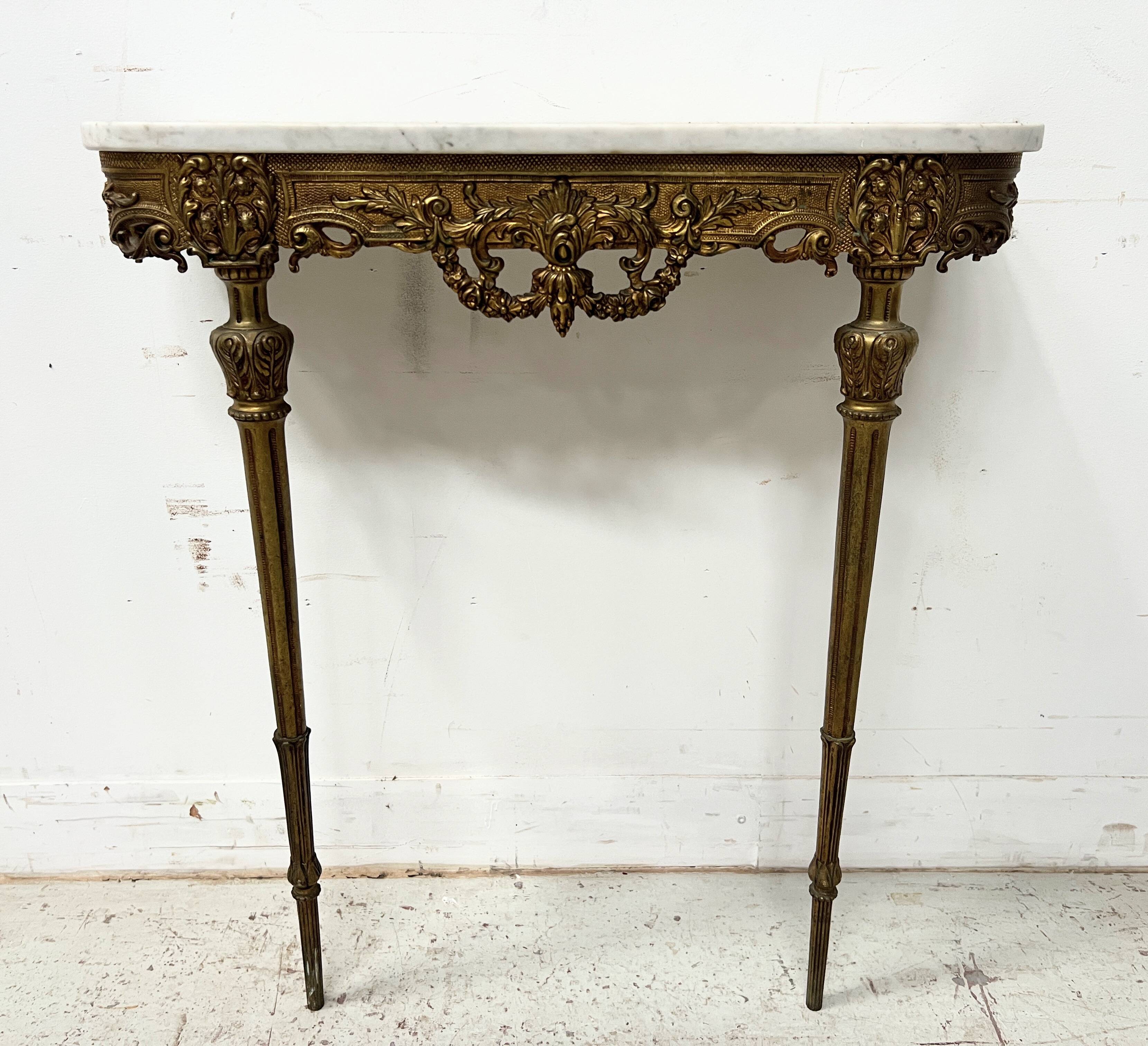 Louis XVI style console in chiselled bronze, 20th century.