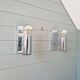 Pair of tubular chrome-plated metal wall sconces, 1970s