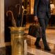 Hollywood Regency style umbrella stand, brass finish and lio pattern.