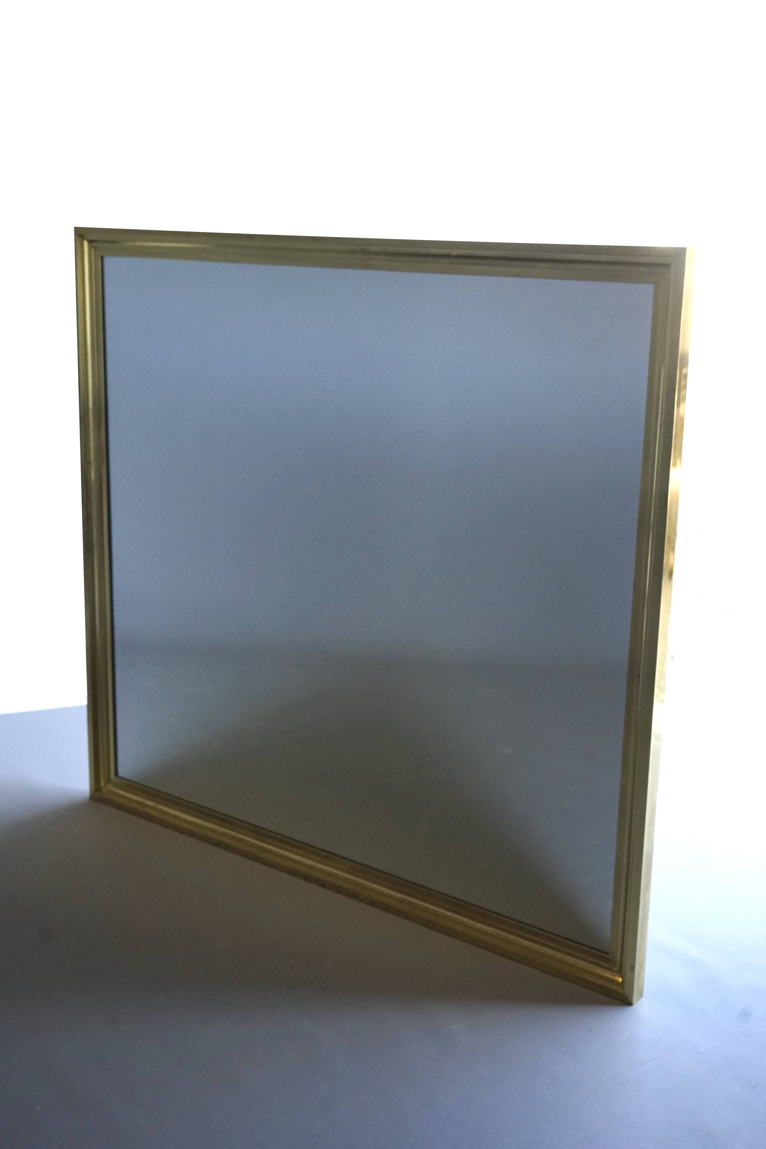 Grand miroir en laiton dans le style de Maison Jansen, années 1960.