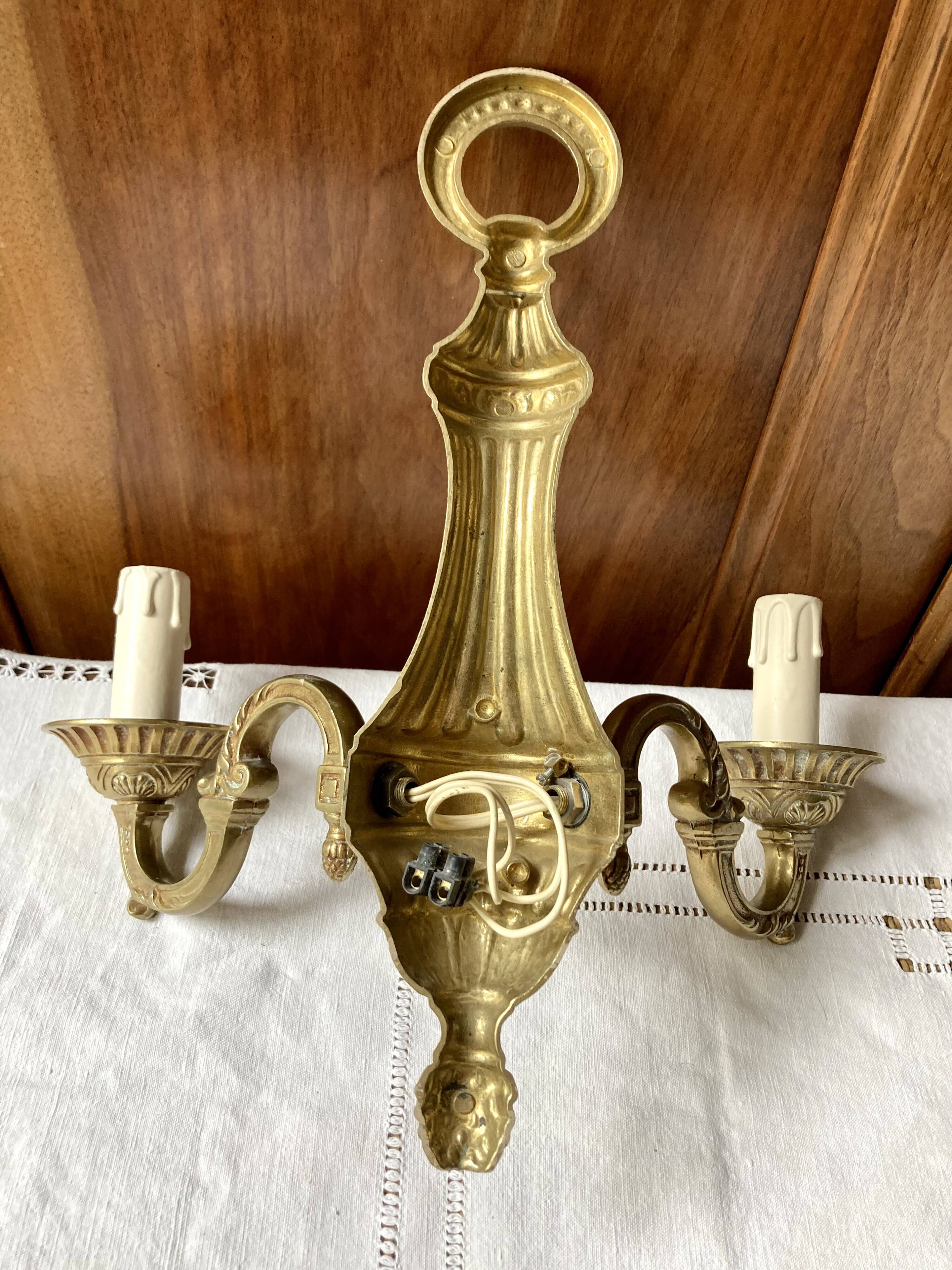 Pair of bronze wall lights