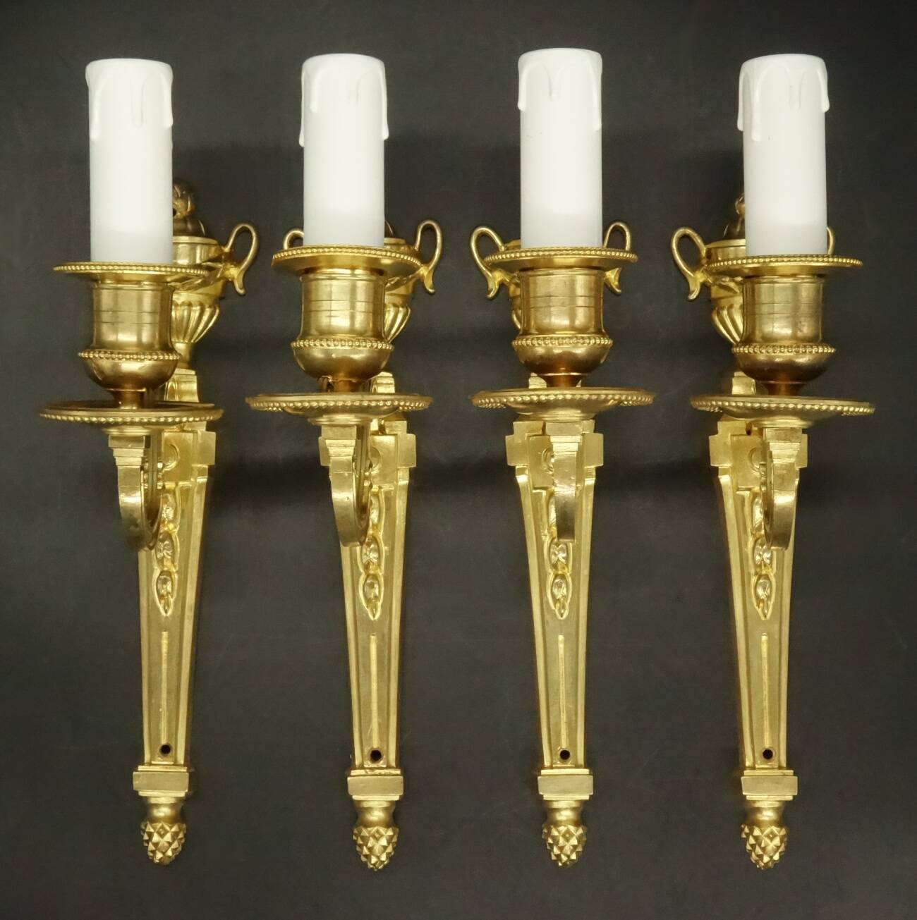 Set of 4 Louis XVI style 1-light wall lights from the 19th century - gilded bronze