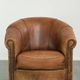 Vintage sheepskin clubchair in a beautiful cognac colour with a sturdy look