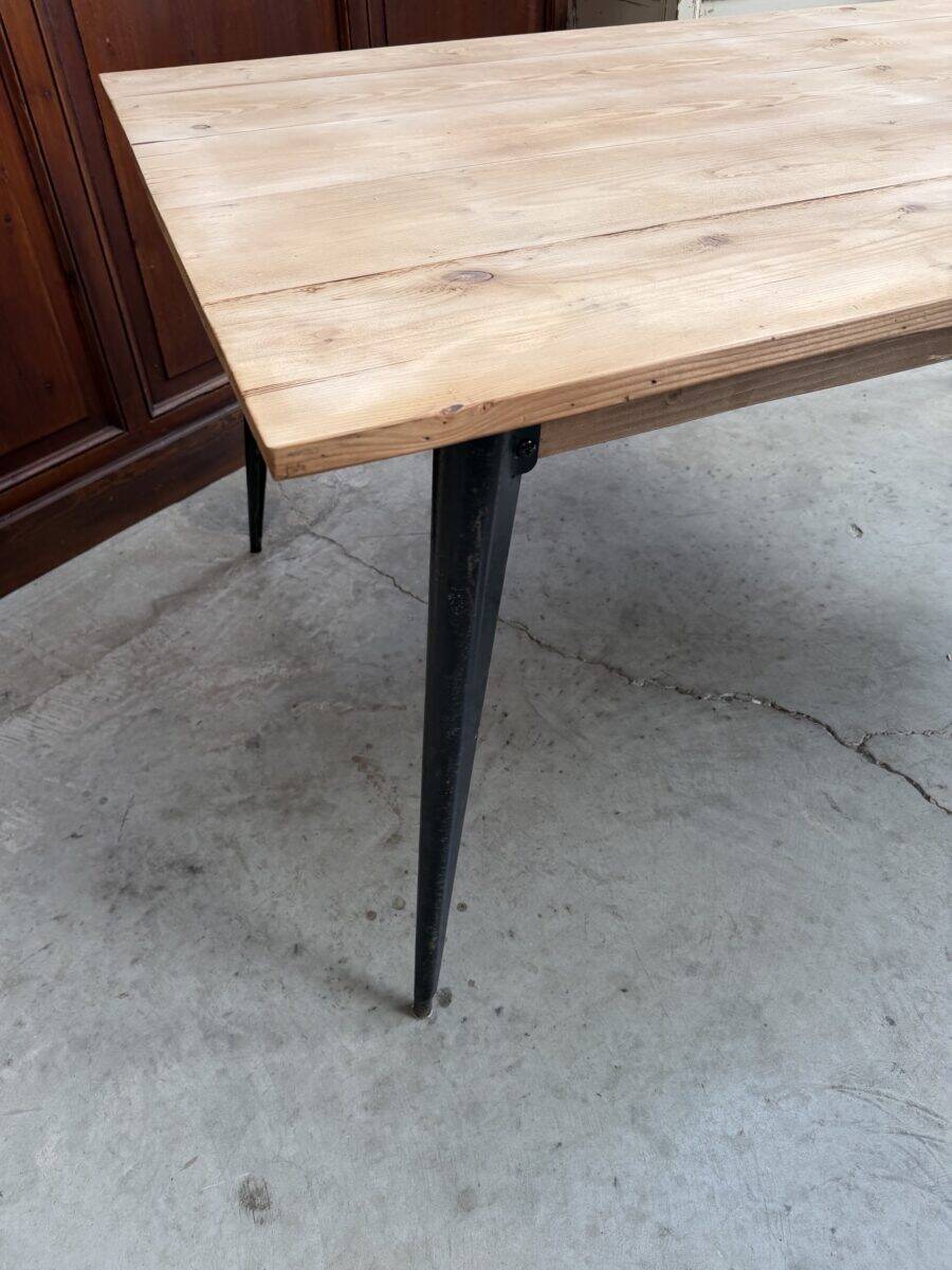 Old fir table with Tolix legs.