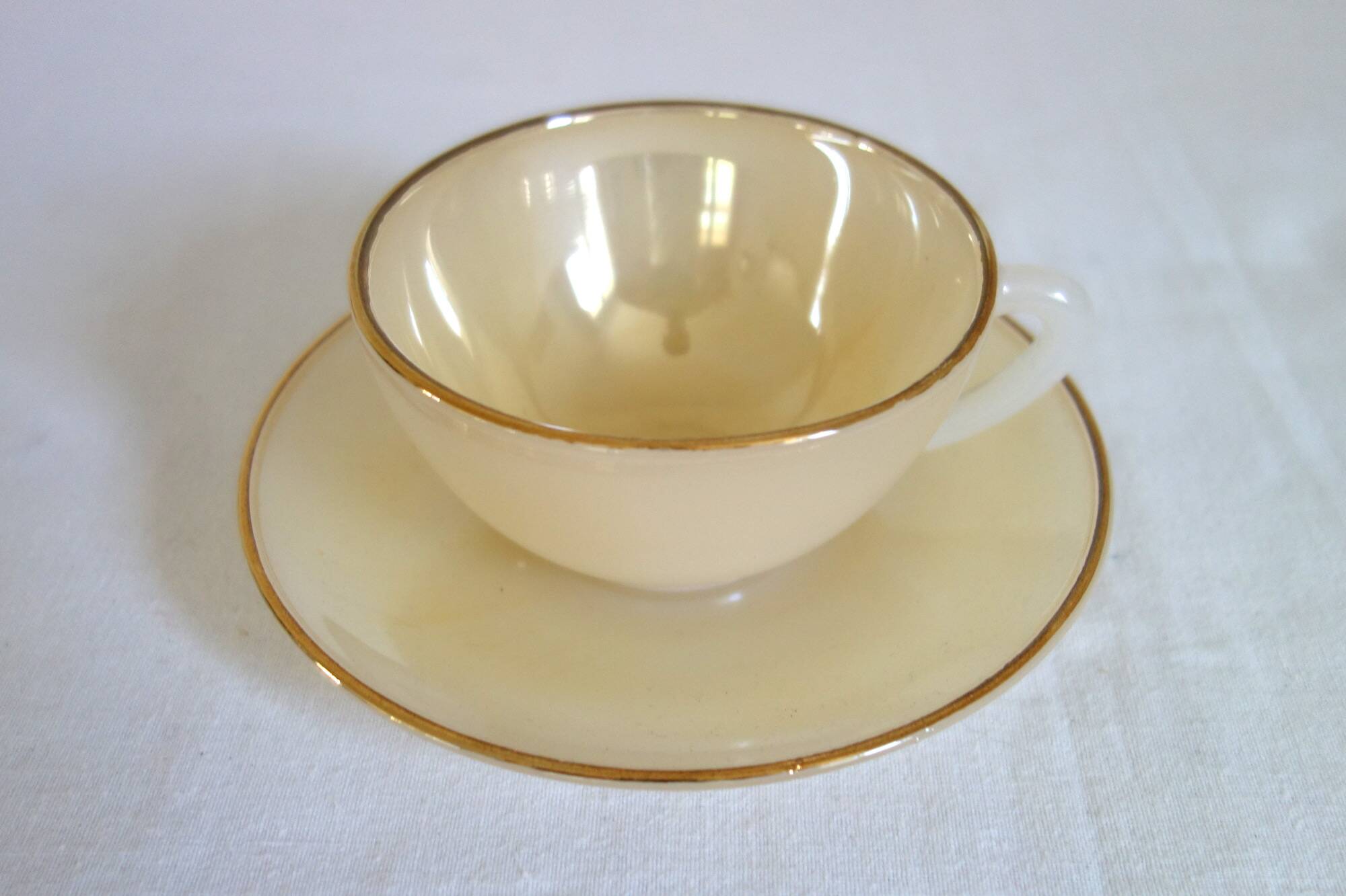 5 vintage Arcopal Harlequin teacups with saucers