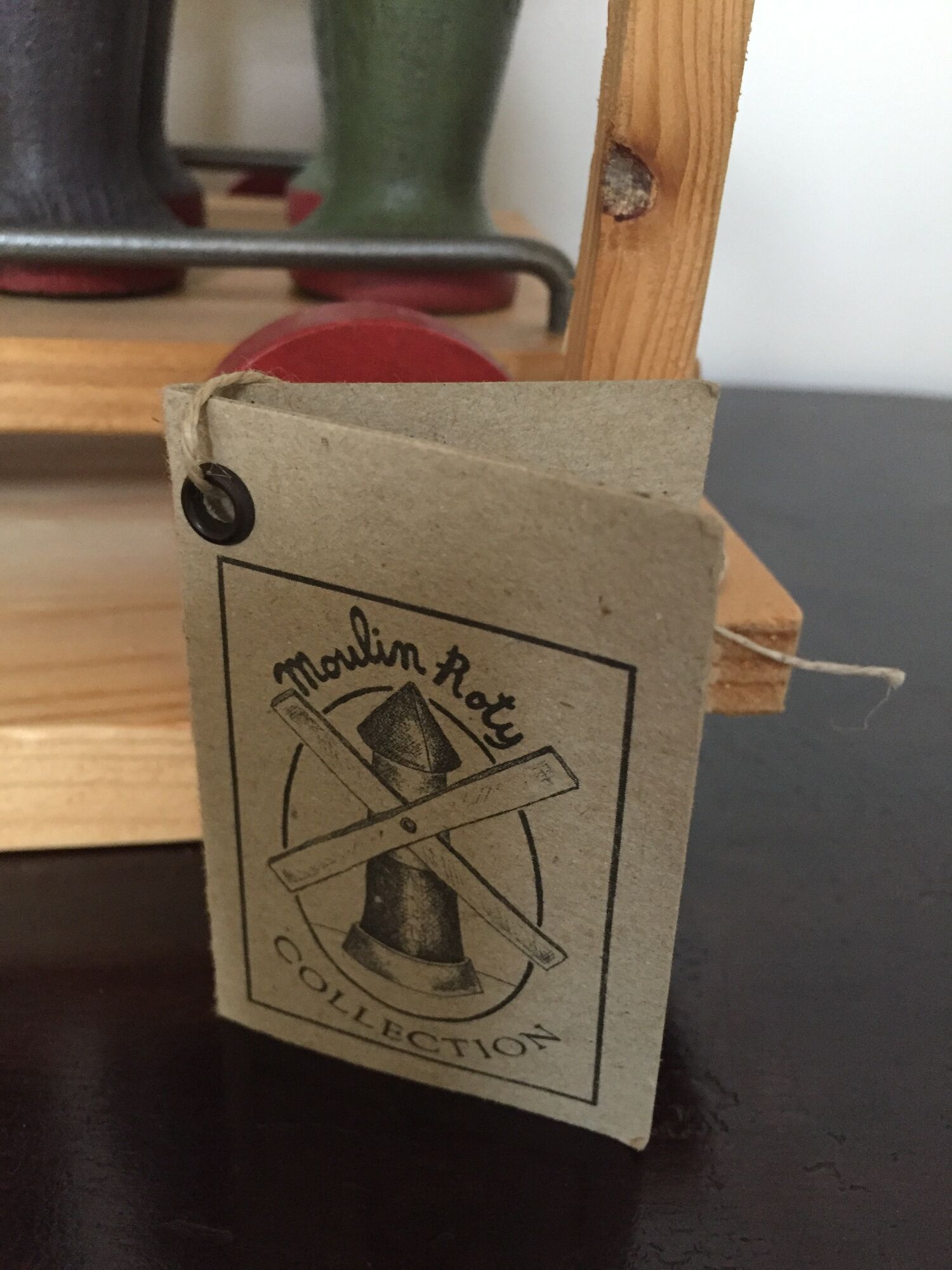 Set of Moulin Roty brand wooden bowling on roller cart, limited series.