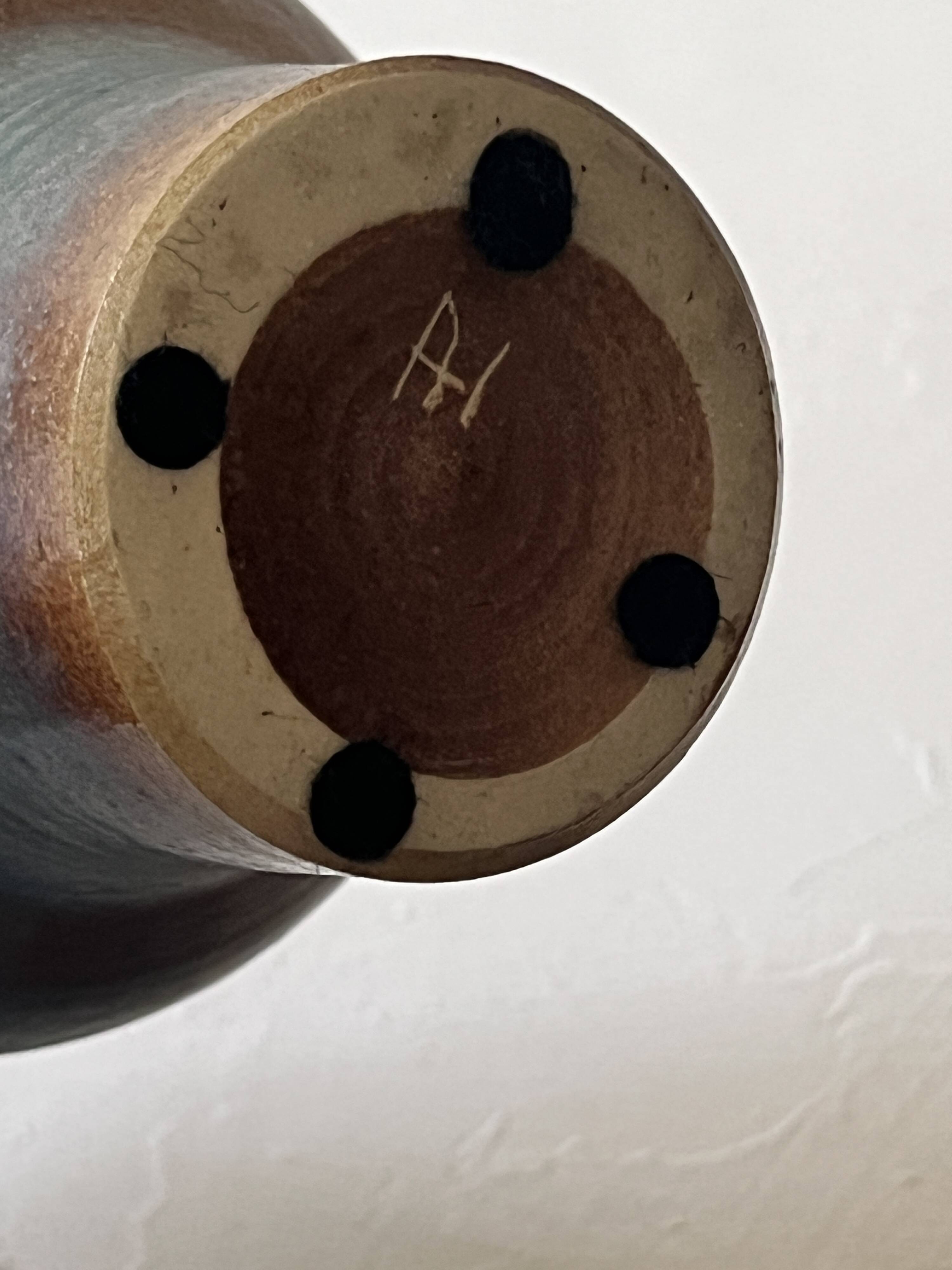 Brownish blue ceramic vase signed AH, France 1950.