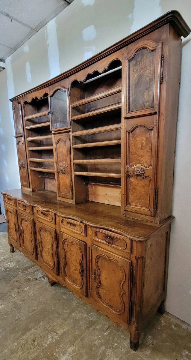 Clockside cabinet from the Louis XV period in walnut and elm, fully carved.