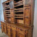 Clockside cabinet from the Louis XV period in walnut and elm, fully carved.