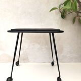 Black table on wheels from the 60s