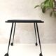 Black table on wheels from the 60s