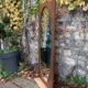 Miroir oval biseauté sur porte art déco Acajou 79x162