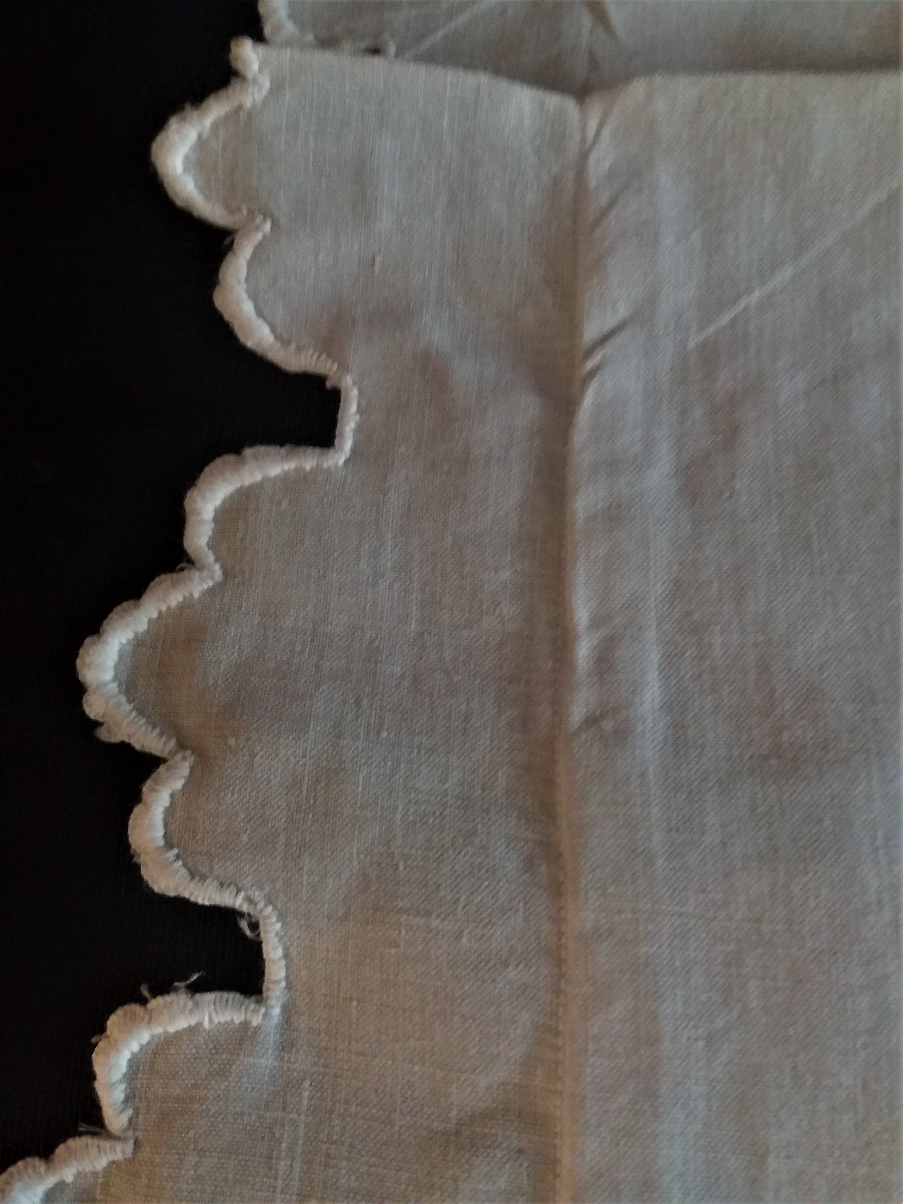 Pair of antique hand-embroidered linen pillowcases