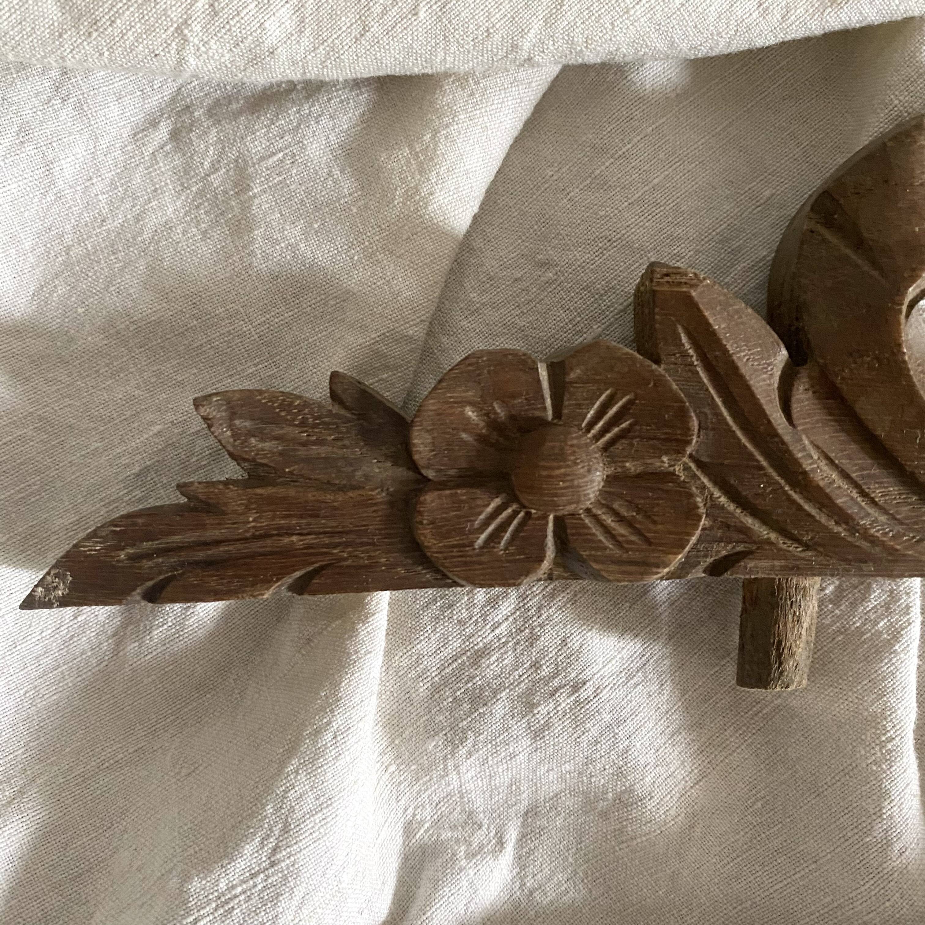 Antique carved wooden ribbon pediment