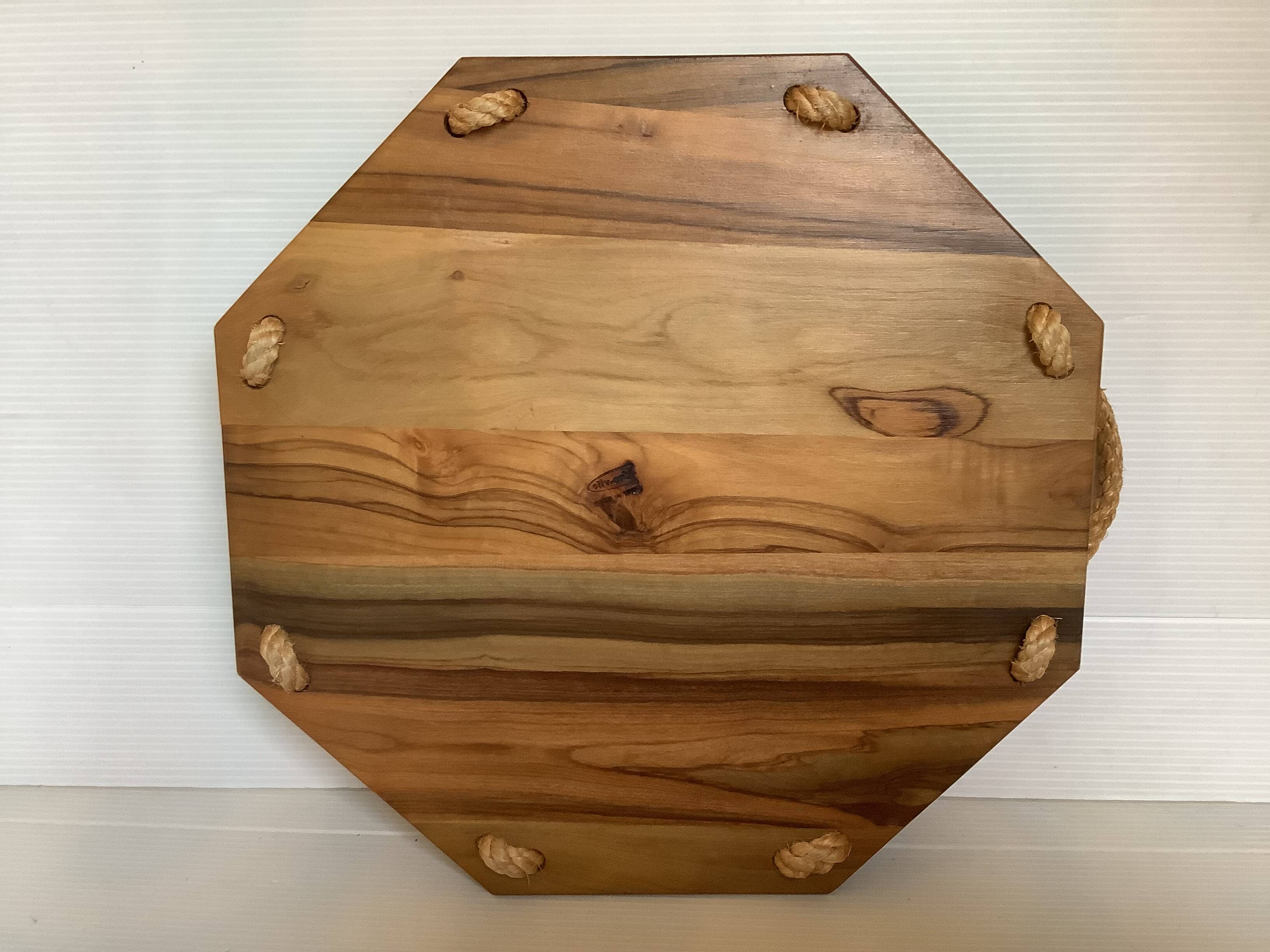 Small octagonal tray made of wood and rope.