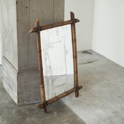 Large faux bamboo mirror in solid wood and patinated mirror, early 20th century.