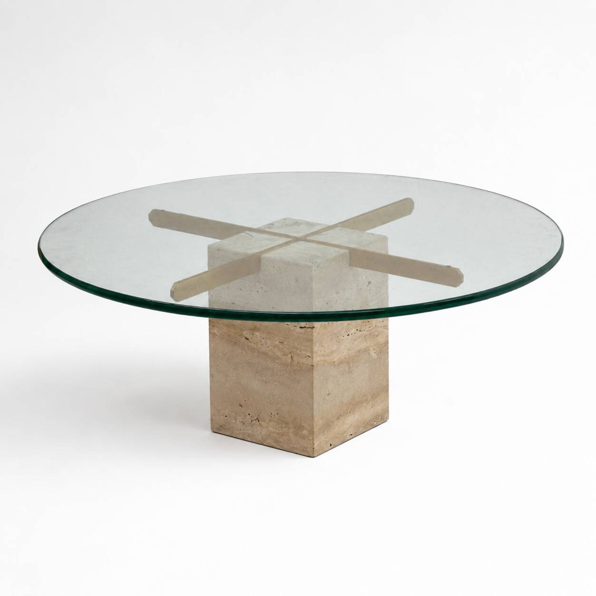 Vintage round coffee table with thick glass top and travertine and brass base