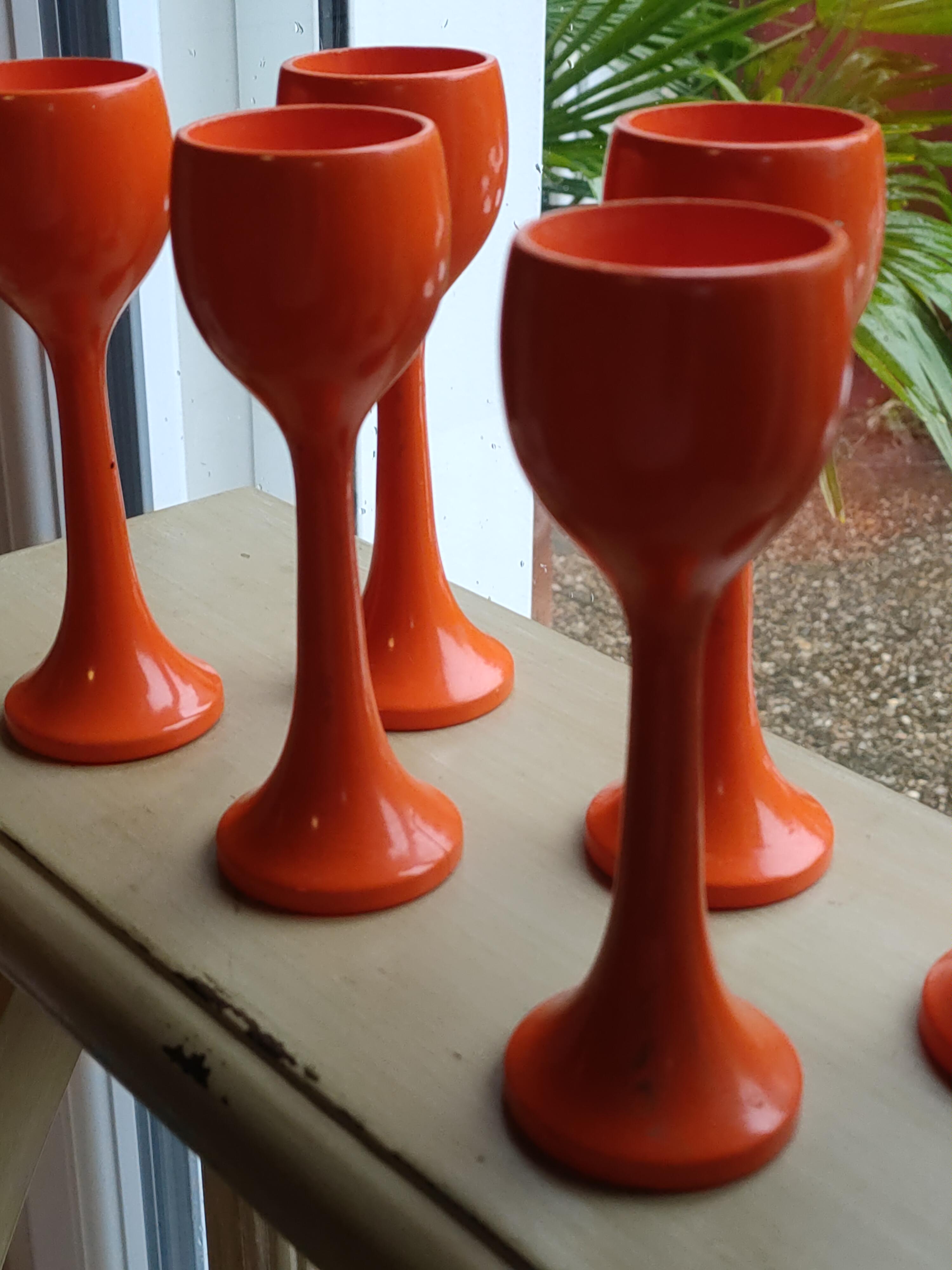 6 orange tulip shaped cockroaches