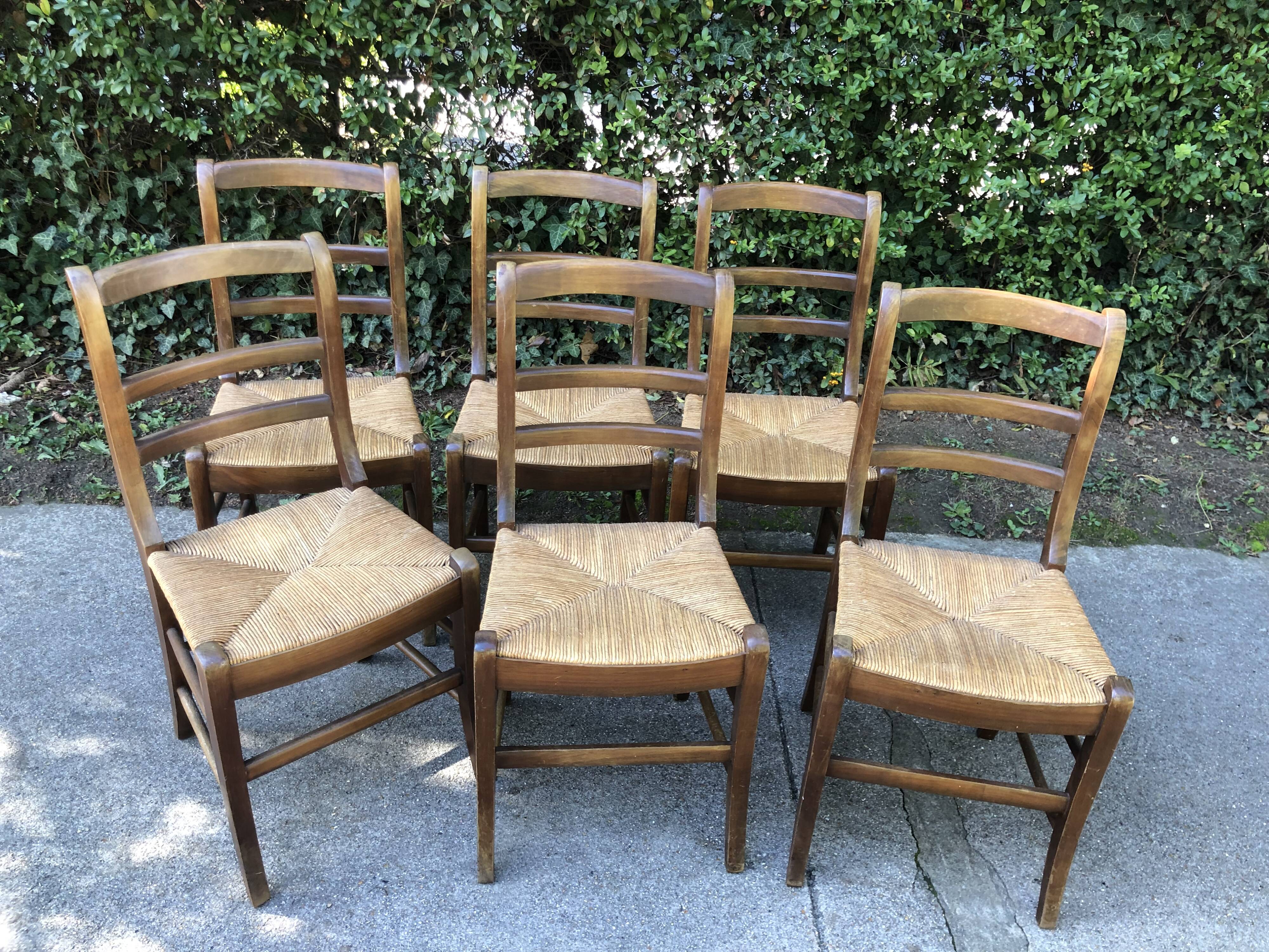 Six rustic mulched chairs