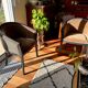 Pair of Art Deco barrel chairs in black and bronze