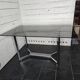 Vintage chrome metal table with smoked glass top