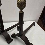 Old pair of wrought iron and bronze andirons