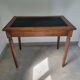Antique desk made of solid wood and leather.