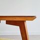 Table basse pieds compas dessus marqueté