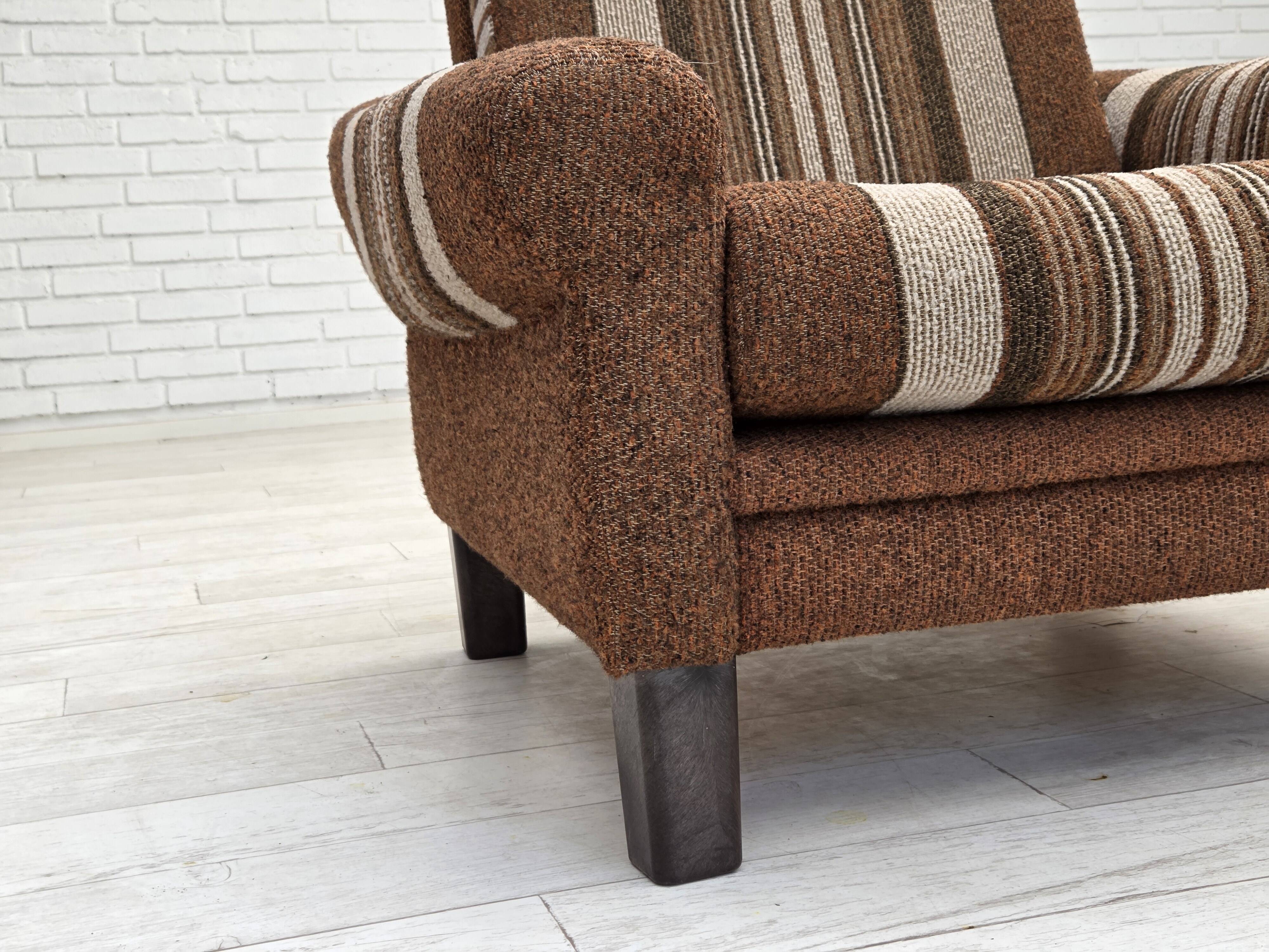 Danish club chair from the 1970s, original wool upholstery, original condition.