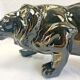 Art Deco lion statue 1930 cracked Saint Clément