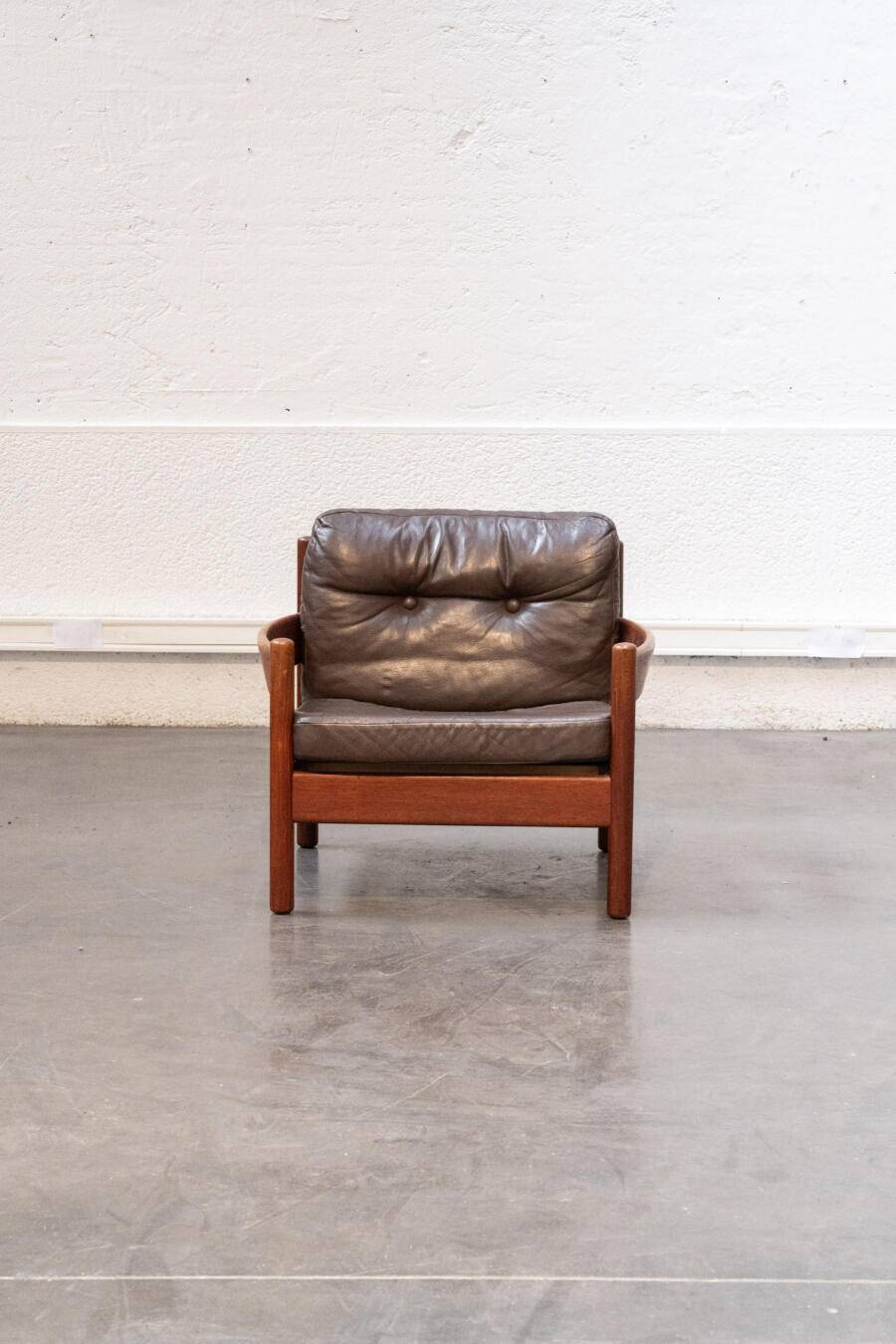 Teak and leather armchair
