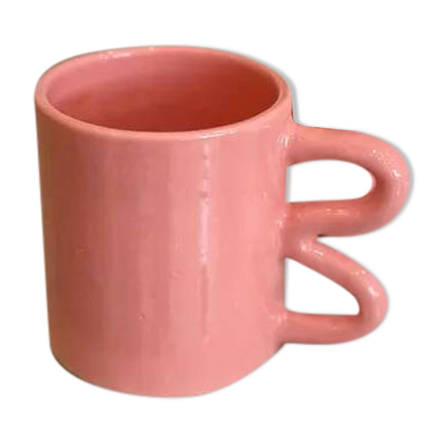Ceramic mug with wave handle