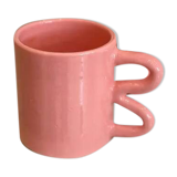 Ceramic mug with wave handle