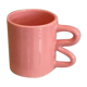 Ceramic mug with wave handle