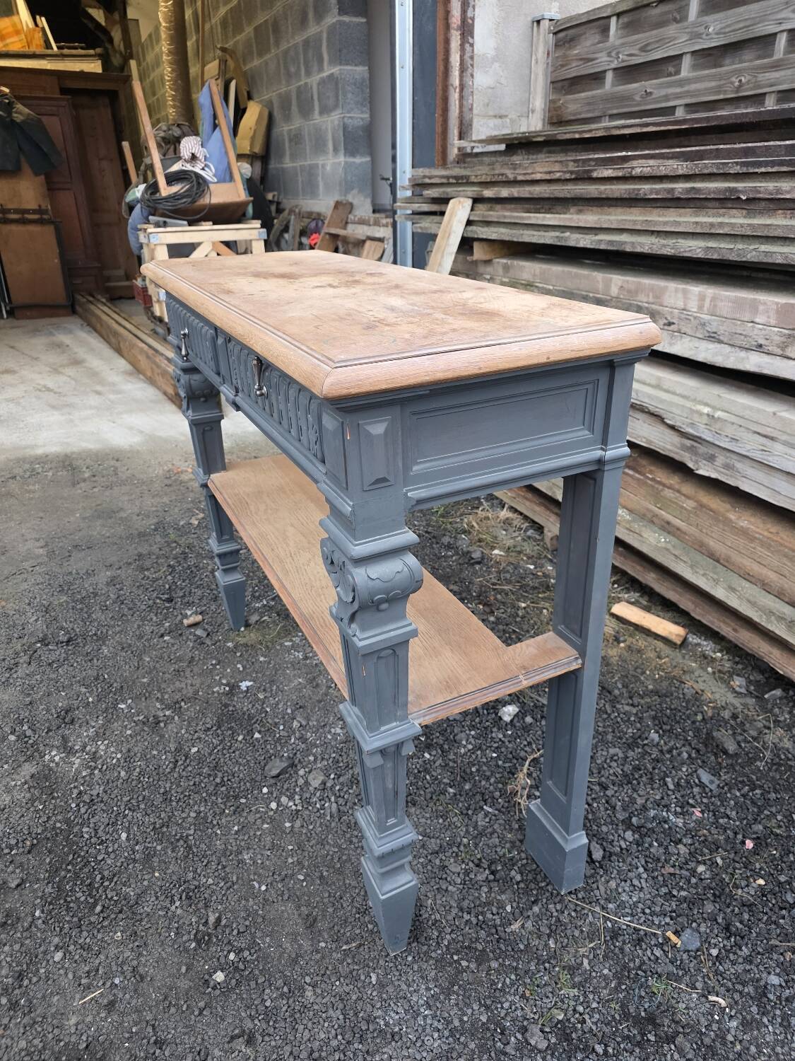 Console in patinated solid oak, late 19th century.