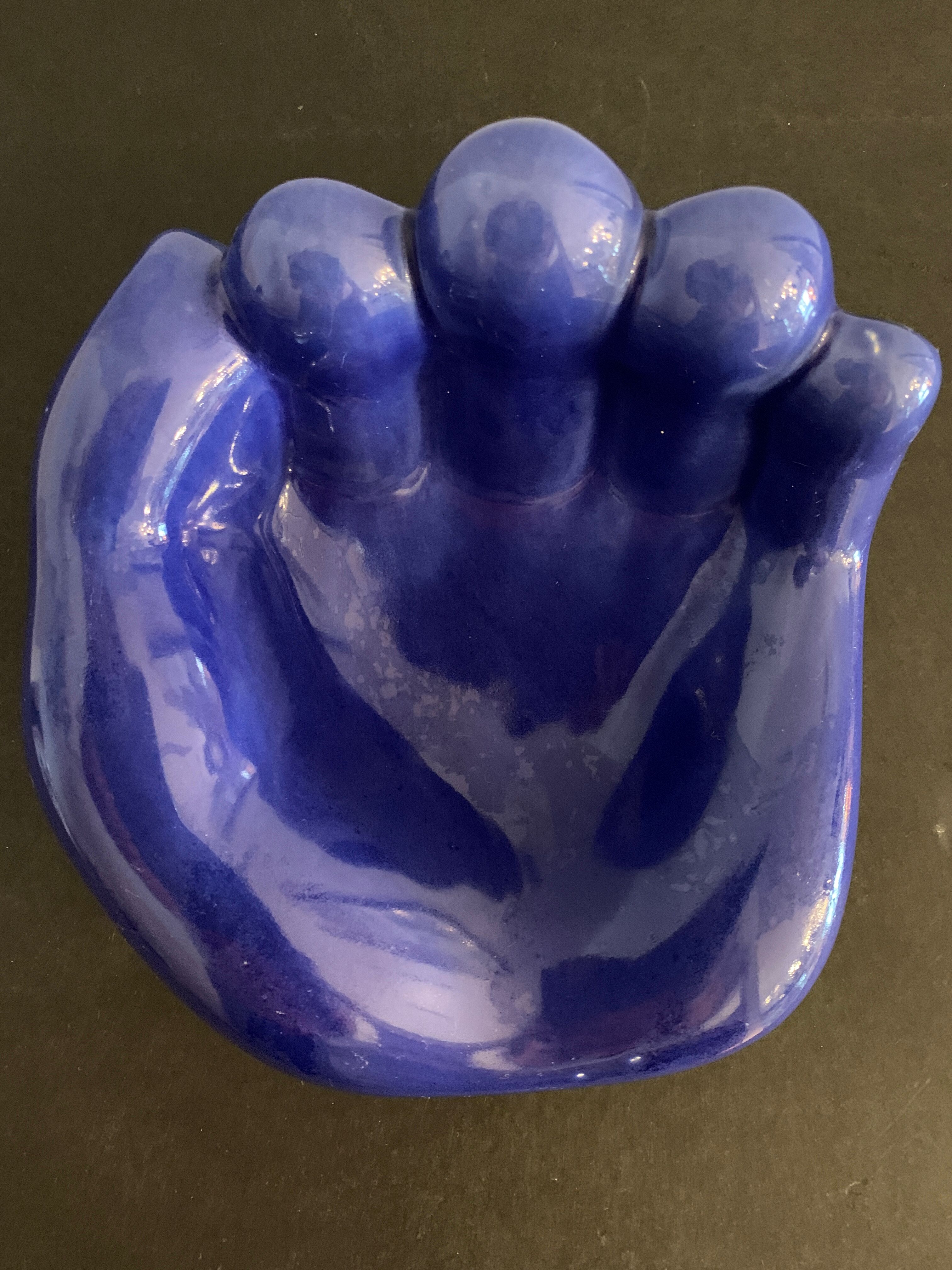 Ceramic ashtray, blue hand shape