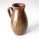 Beautiful pitcher in speckled sandstone